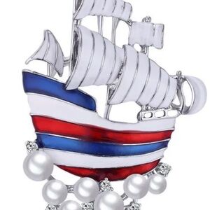 Elegant Silver Ship Brooch with Red, White, and Blue Accents NEW